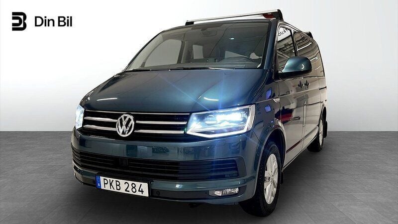 Mörkgrön Begagnad 2017 VW Multivan Comfortline Kombi | 329 900 kr (Superpris) - Bild 1/4