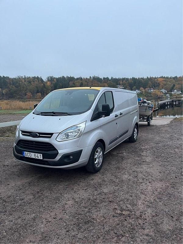 Grå Begagnad 2014 Ford Transit Custom | 75 000 kr (Marknadspris) - Bild 1/3