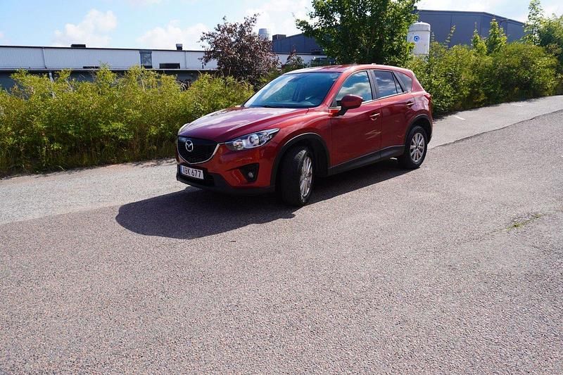 Röd Begagnad 2014 Mazda CX-5 SUV | 99 900 kr (Marknadspris) - Bild 1/4