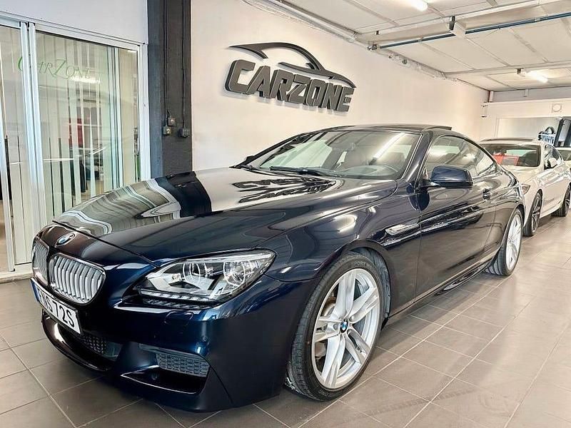 Mörkblå Begagnad 2012 BMW 650 M Sport Sportkupé | 249 900 kr - Bild 1/4