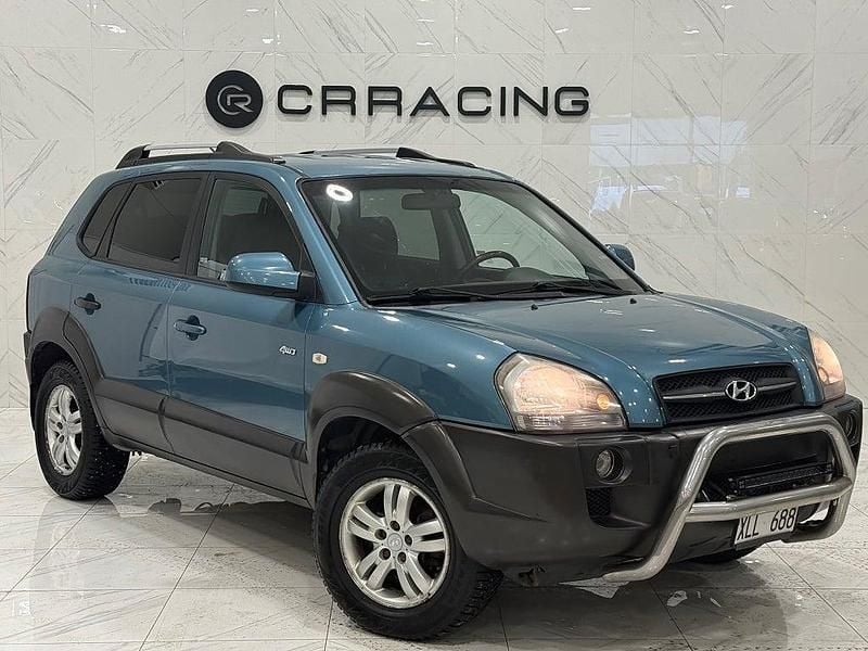 Blå Begagnad 2005 Hyundai Tucson SUV | 44 900 kr (Marknadspris) - Bild 1/4