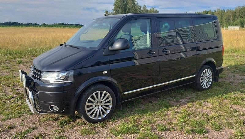 Svart Begagnad 2014 VW Multivan Highline Minibuss | 225 000 kr (Marknadspris) - Bild 1/4