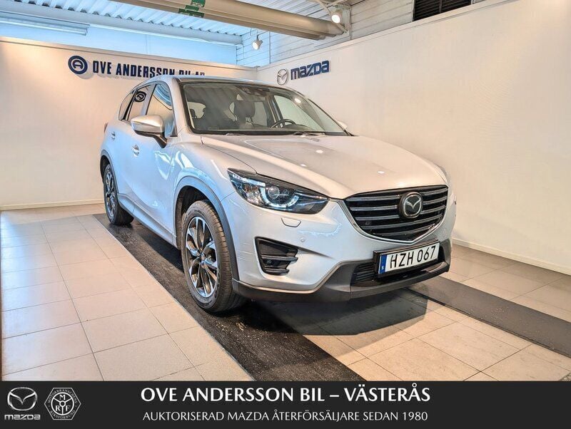 Grå Begagnad 2015 Mazda CX-5 Optimum SUV | 179 900 kr (Marknadspris) - Bild 1/4