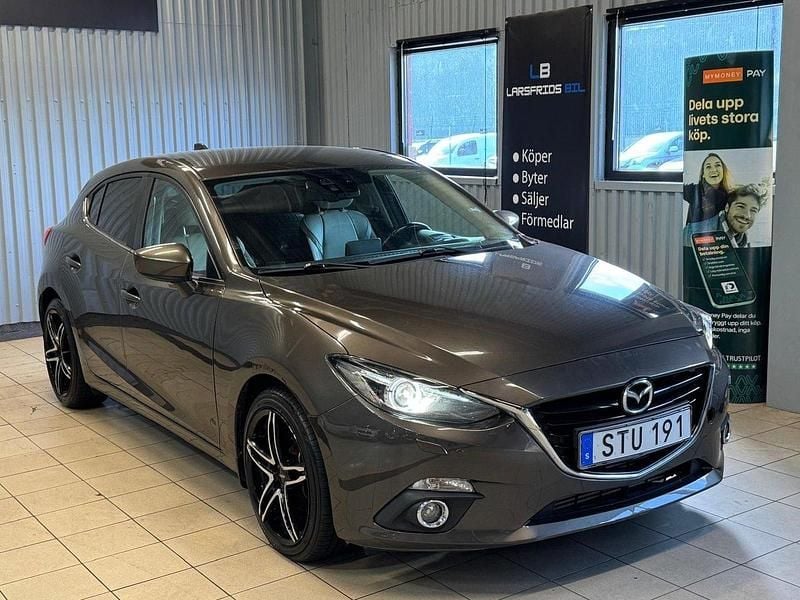 Brun Begagnad 2014 Mazda 3 Inclusive Halvkombi | 64 900 kr (Superpris) - Bild 1/4