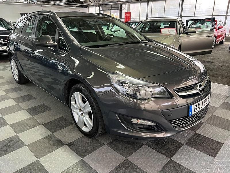 Grå Begagnad 2014 Opel Astra Enjoy Kombi | 74 500 kr (Lite dyr) - Bild 1/4