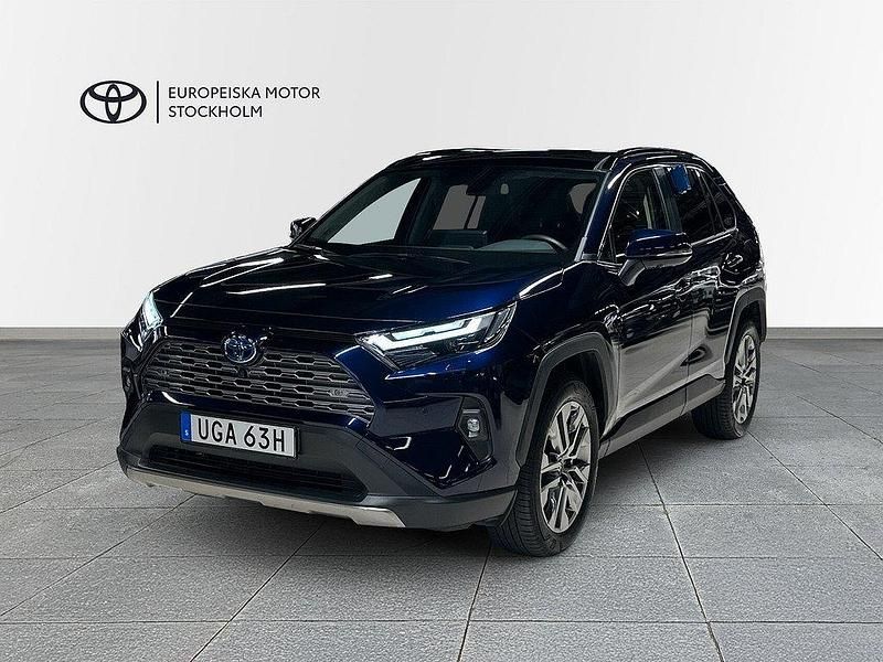 Mörkblå Begagnad 2024 Toyota RAV4 Hybrid Executive SUV | 514 900 kr (Lite dyr) - Bild 1/4