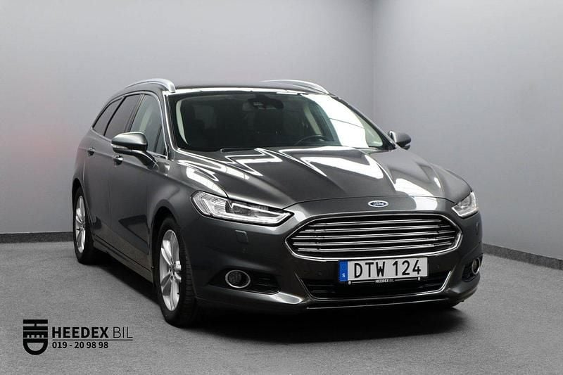 Grå Begagnad 2014 Ford Mondeo Titanium Kombi | 129 800 kr (Marknadspris) - Bild 1/4