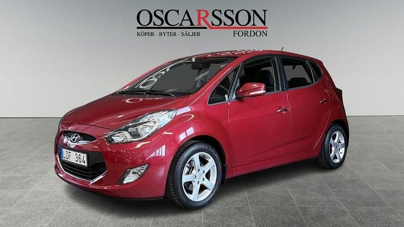 Mörkröd (röd) Begagnad 2011 Hyundai ix20 Minibuss | 104 900 kr (Marknadspris) - Bild 1/4