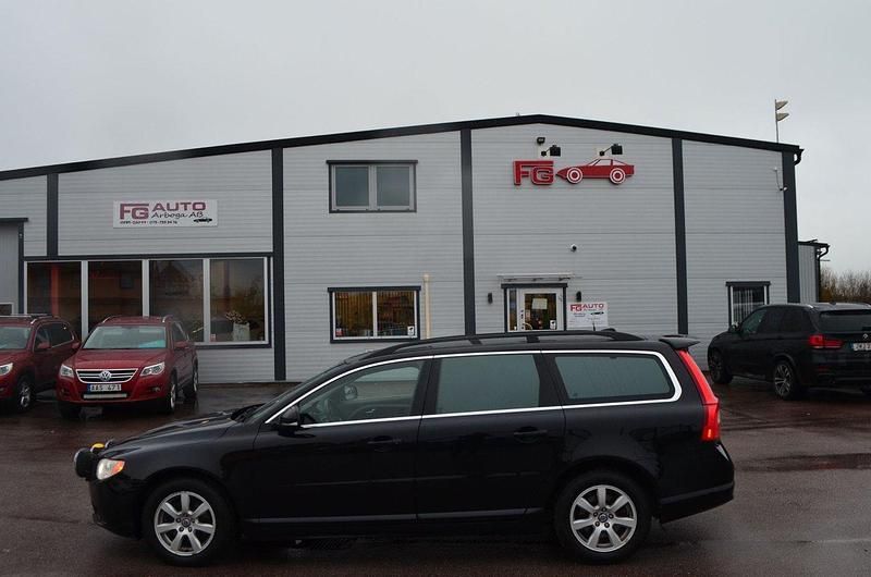 Svart Begagnad 2011 Volvo V70 Momentum Kombi | 89 900 kr (Marknadspris) - Bild 1/4