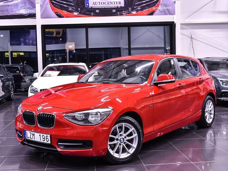 Röd Begagnad 2011 BMW 116 Sport Line Halvkombi | 99 900 kr (Marknadspris) - Bild 1/4