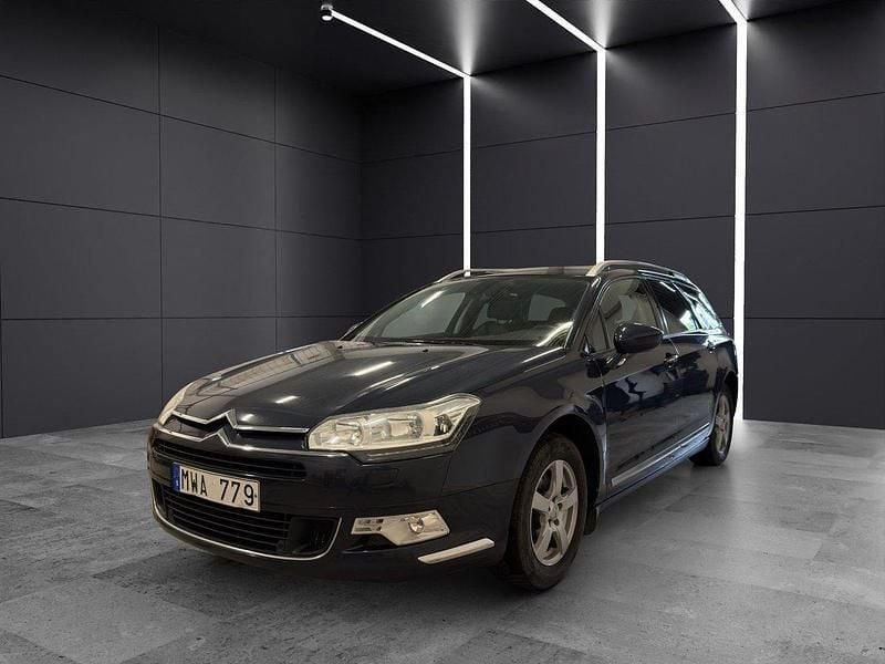 Mörkblå Begagnad 2012 Citroën C5 Kombi | 49 900 kr (Marknadspris) - Bild 1/4