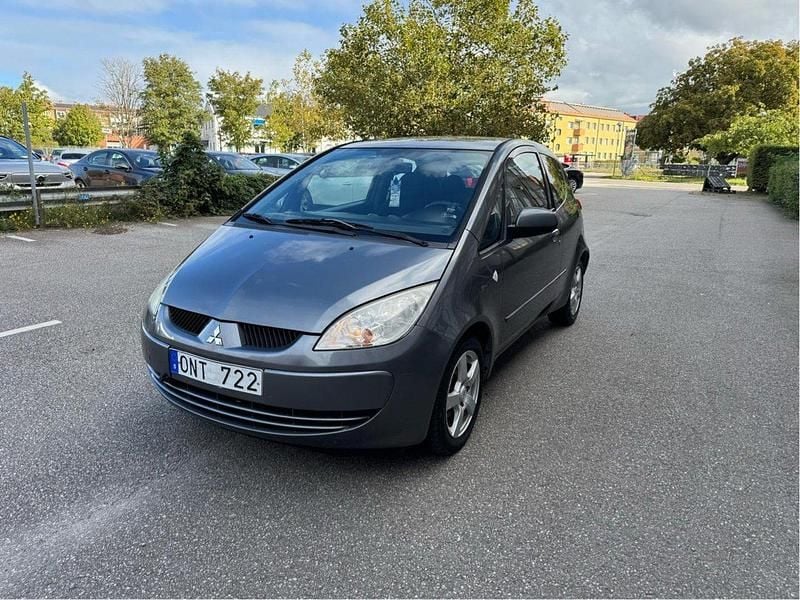 Grå Begagnad 2007 Mitsubishi Colt Halvkombi | 24 999 kr (Marknadspris) - Bild 1/4