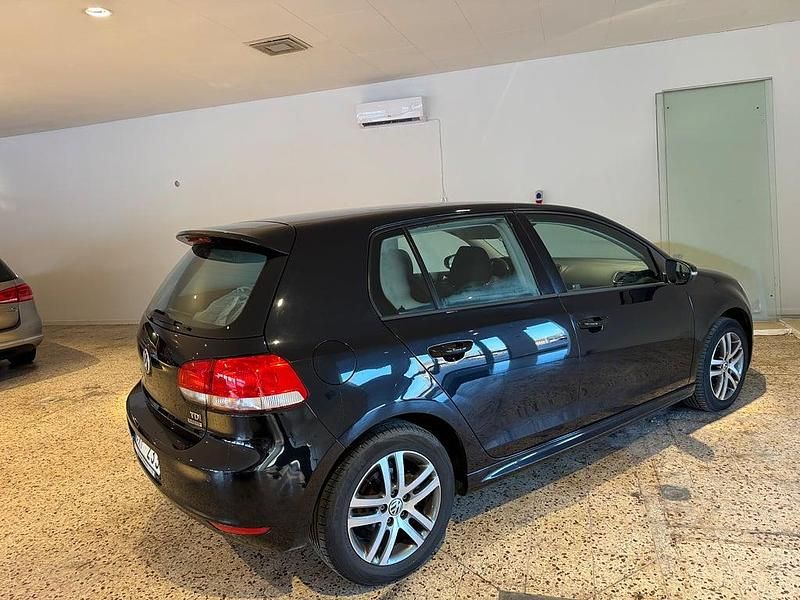 Begagnad VW Golf VII 105 HK (77 kW) 2012 Svart Halvkombi