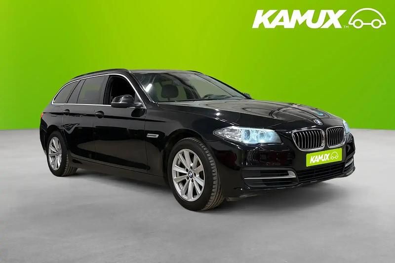 Svart Begagnad 2014 BMW 520 Kombi | 127 400 kr (Marknadspris) - Bild 1/4