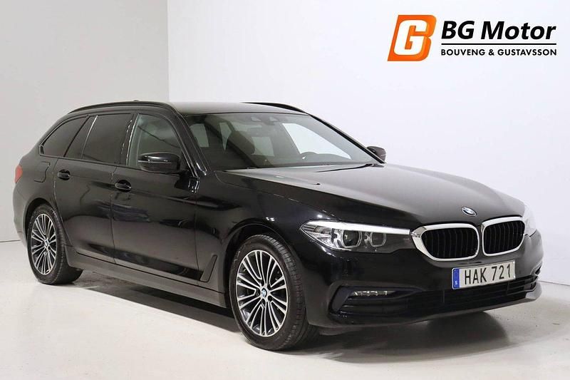 Svart Begagnad 2018 BMW 520 Sport Line Kombi | 219 700 kr (Lite dyr) - Bild 1/3