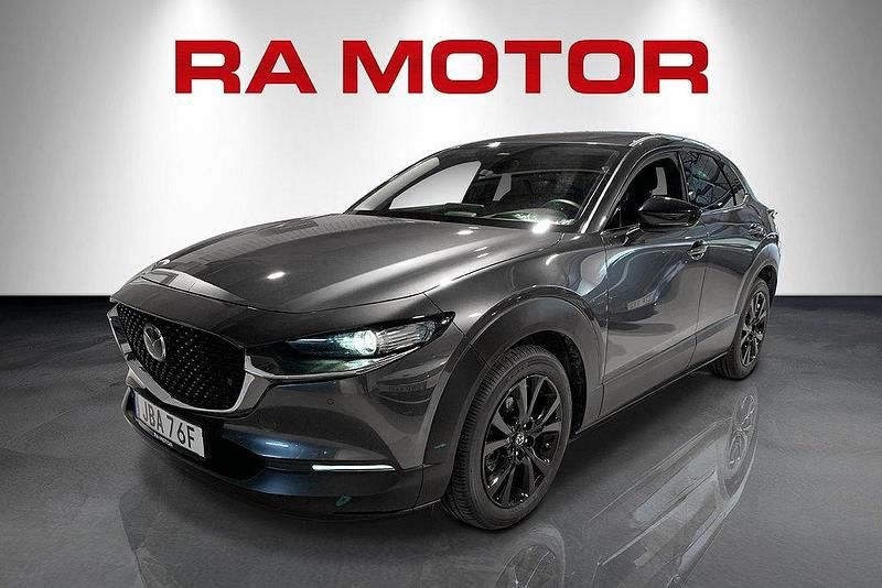 Grå Begagnad 2024 Mazda CX-30 Homura-Line SUV | 299 800 kr - Bild 1/4