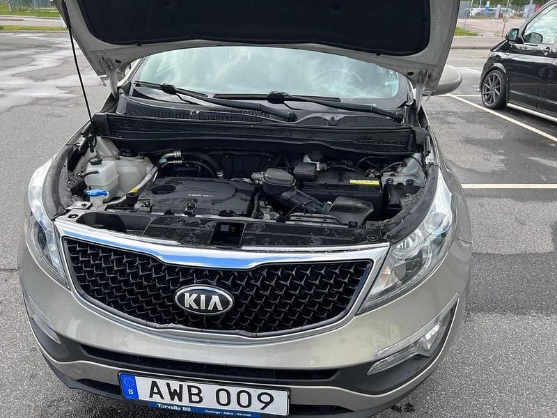 Grå Begagnad 2015 Kia Sportage SUV | 98 000 kr (Marknadspris) - Bild 1/4