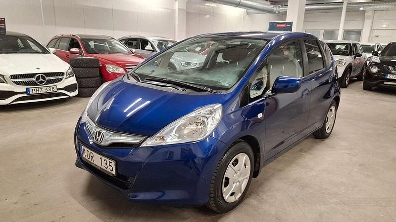 Mörkblå (blå) Begagnad 2012 Honda Jazz Halvkombi | 115 000 kr - Bild 1/4
