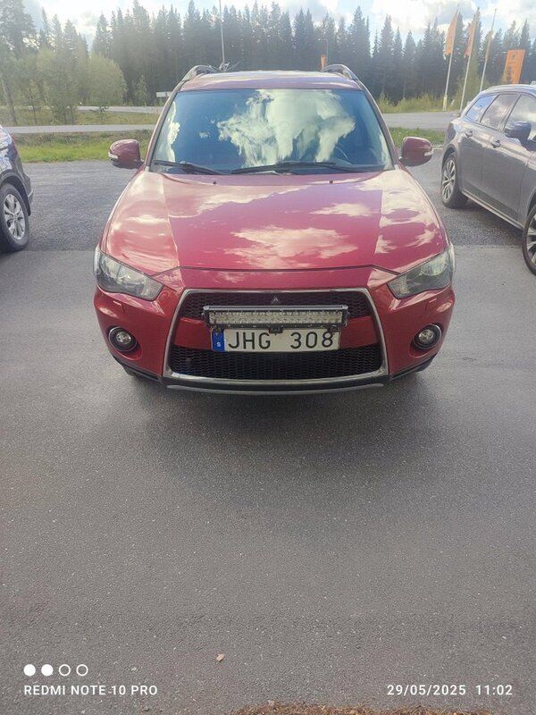 Röd Begagnad 2011 Mitsubishi Outlander Edition SUV | 69 000 kr (Marknadspris) - Bild 1/4