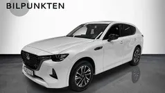 Rhodium white metallic Begagnad 2022 Mazda CX-60 Homura-Line SUV | 394 900 kr (Marknadspris)