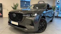 Platinum metallic Ny 2025 Mazda CX-60 Homura-Line SUV | 597 200 kr (Marknadspris)