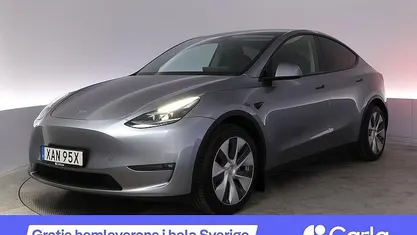 Grå Begagnad 2023 Tesla Model Y Long Range AWD SUV | 389 990 kr (Marknadspris)