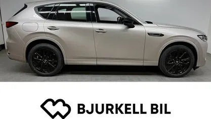 Platinum metallic Begagnad 2024 Mazda CX-60 Homura-Line SUV | 599 900 kr (Marknadspris)