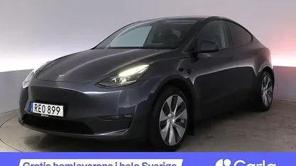 Grå Begagnad 2023 Tesla Model Y Long Range AWD SUV | 421 900 kr (Marknadspris)