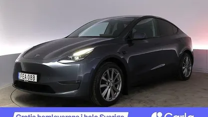 Begagnad Tesla Model Y Long Range AWD 378 kW (514 HK) 2023 Grå SUV