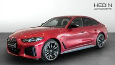 Röd (red) Begagnad 2025 BMW i4 Comfort Edition Sedan | 648 700 kr (Marknadspris)