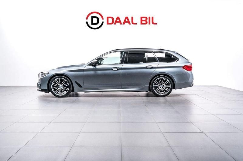 Blå Begagnad 2018 BMW 520 M Sport Kombi | 284 700 kr (Lite dyr) - Bild 1/4