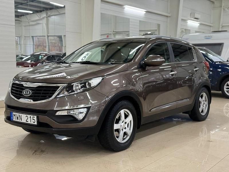 Brun metallic Begagnad 2013 Kia Sportage EX SUV | 99 900 kr (Marknadspris) - Bild 1/4