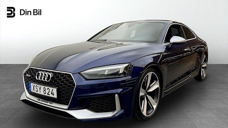 Navarrablå metallic Begagnad 2017 Audi RS5 Sportkupé | 559 000 kr (Marknadspris) - Bild 1/4