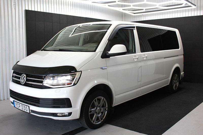 Vit Begagnad 2016 VW Caravelle Comfortline Minibuss | 199 000 kr - Bild 1/4