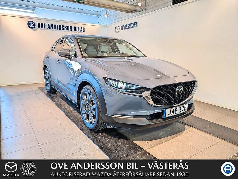 Grå Begagnad 2022 Mazda CX-30 Cosmo SUV | 279 900 kr (Marknadspris) - Bild 1/4
