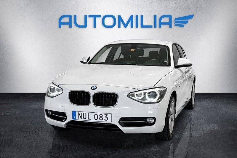 Vit Begagnad 2012 BMW 118 Sport Line Halvkombi | 69 900 kr (Lite dyr) - Bild 1/4