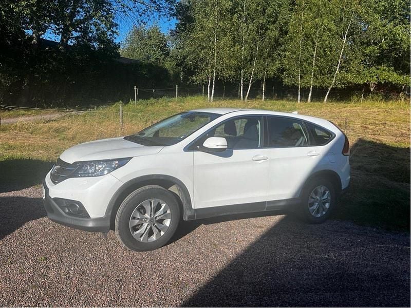 Vit Begagnad 2013 Honda CR-V SUV | 145 000 kr (Marknadspris) - Bild 1/4