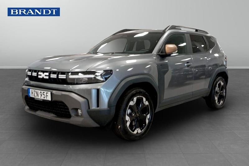 Grå Begagnad 2025 Dacia Duster Extreme SUV | 319 900 kr (Marknadspris) - Bild 1/4