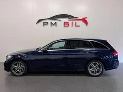 Mörkblå (blå) Begagnad 2020 Mercedes C300e AMG line Kombi | 269 900 kr (Marknadspris)