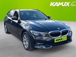 Svart Begagnad 2021 BMW 330e Sport Line Kombi | 284 900 kr (Marknadspris)