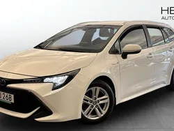 Vit (white) Begagnad 2020 Toyota Corolla Hybrid Kombi | 199 000 kr (Marknadspris)