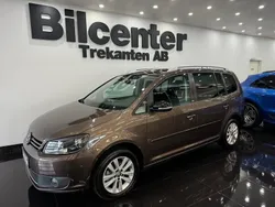 Brun Begagnad 2012 VW Touran Style Minibuss | 99 900 kr