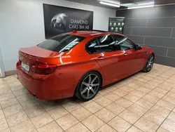 Orange Begagnad 2014 BMW M5 Competition Edition Sedan | 479 900 kr
