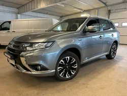 Mörkgrå Begagnad 2015 Mitsubishi Outlander P-HEV Comfort Edition SUV | 114 500 kr (Lite dyr)