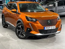 Orange Begagnad 2021 Peugeot e-2008 Allure SUV | 194 900 kr (Marknadspris)