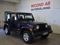 Mörkblå Begagnad 2000 Jeep Wrangler SUV | 149 900 kr