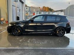 Svart Begagnad 2006 BMW 130 Comfort Edition Halvkombi | 69 000 kr
