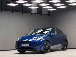 Blå Begagnad 2024 Tesla Model Y Long Range AWD SUV | 479 900 kr (Marknadspris)