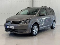 Grå Begagnad 2010 VW Touran Minibuss | 139 900 kr