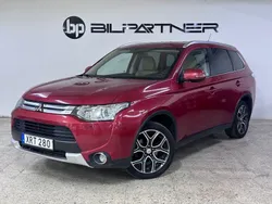 Mörkröd Begagnad 2014 Mitsubishi Outlander SUV | 104 900 kr (Marknadspris)